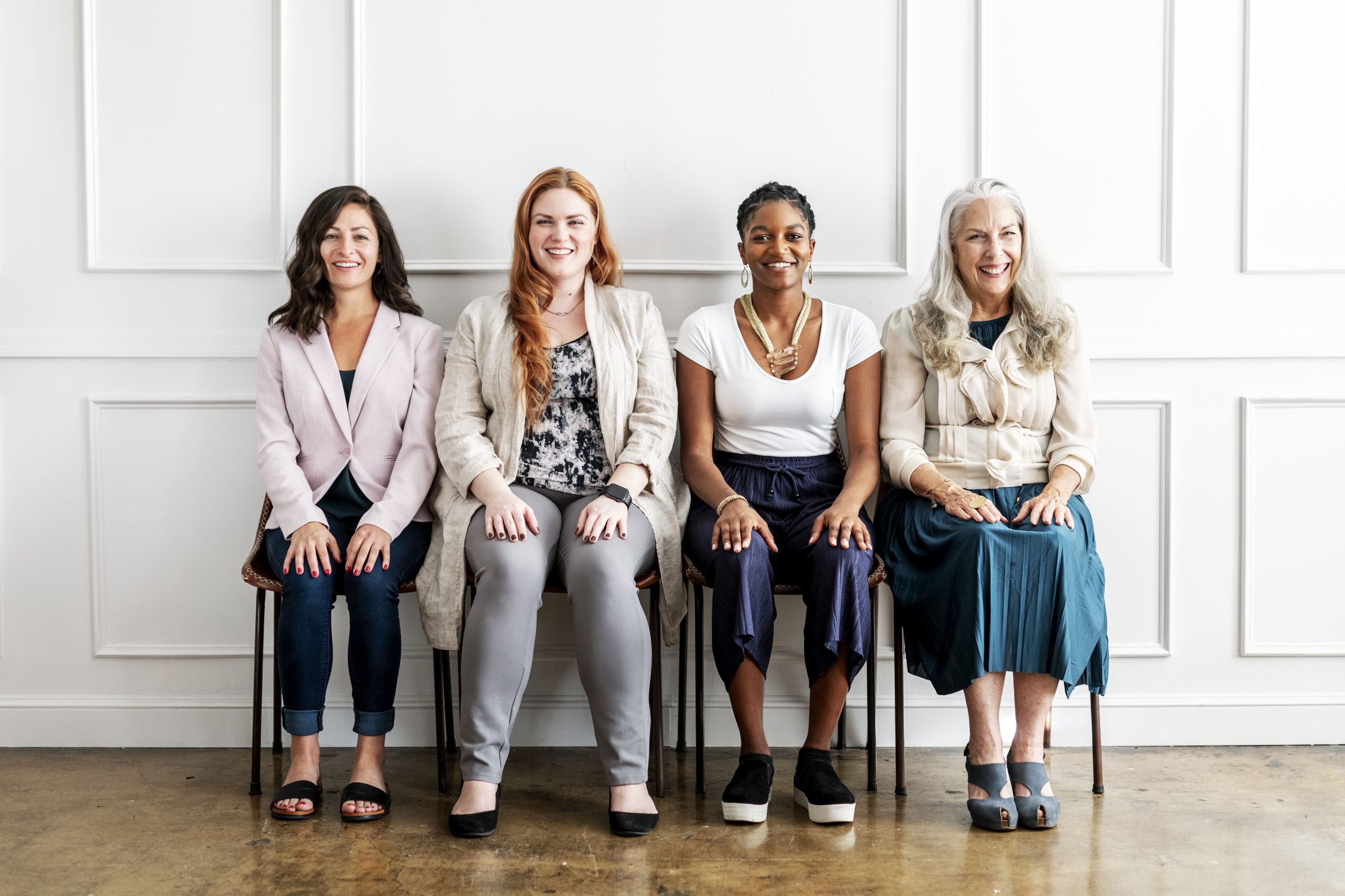 empowering-gorgeous-businesswomen-sitting-together-2023-11-27-05-33-08-utc-min-scaled.jpg